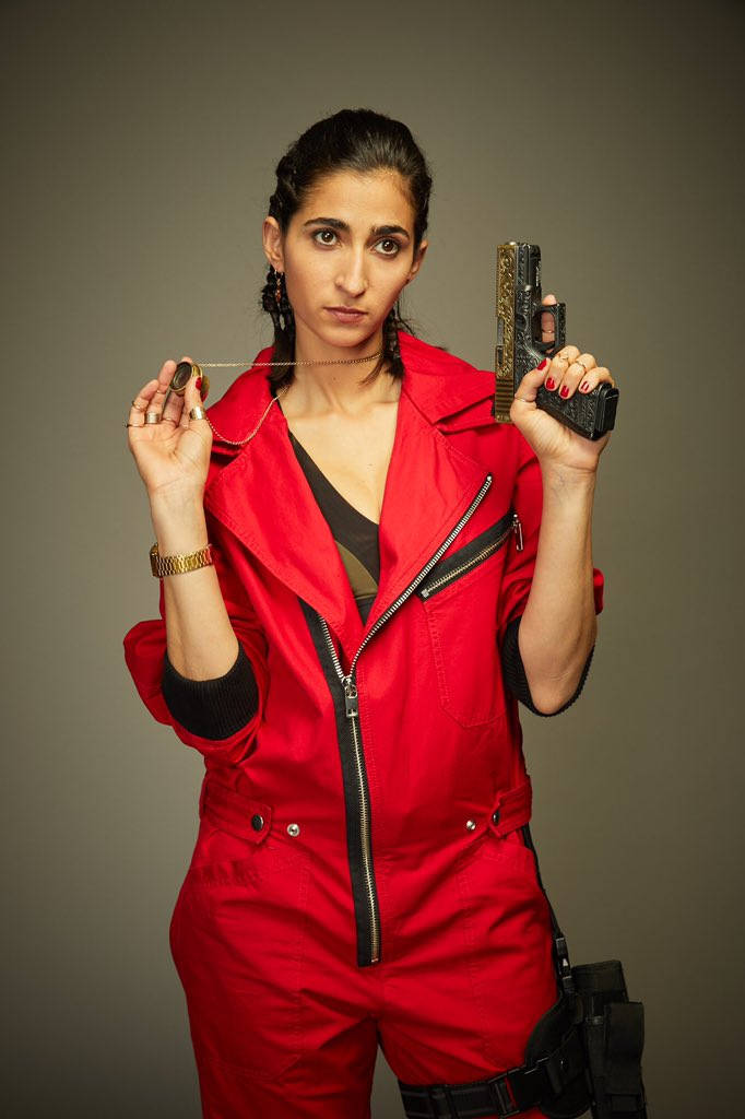 Money Heist Nairobi Gun Portrait Wallpaper