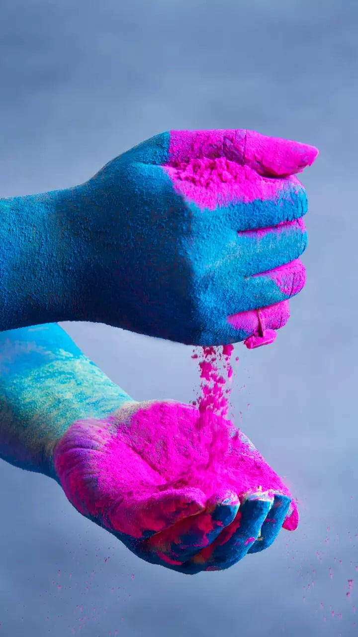 Multicolor Holi Colors On Hand Wallpaper