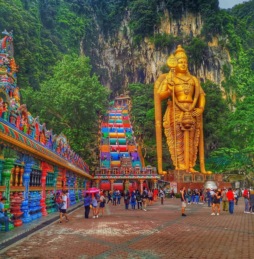 Murugan Statue Surrounded By People Wallpaper