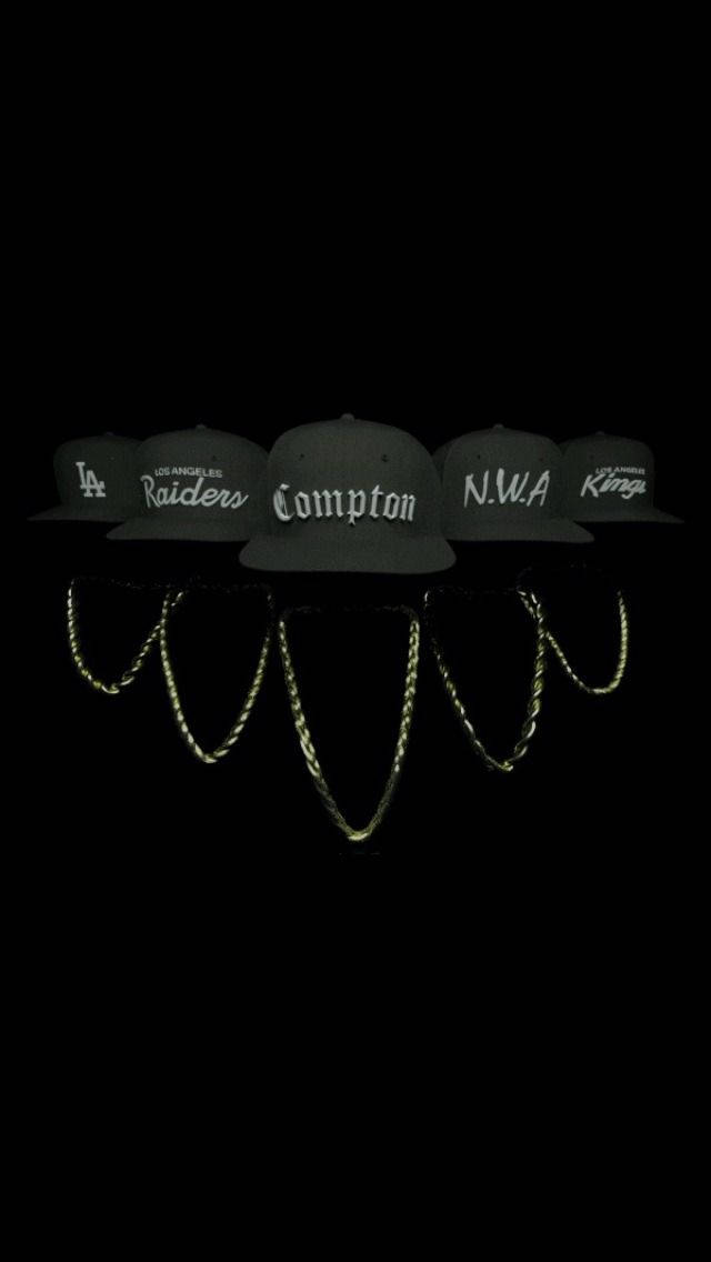 N.w.a. Group Merch Hats And Blings Wallpaper