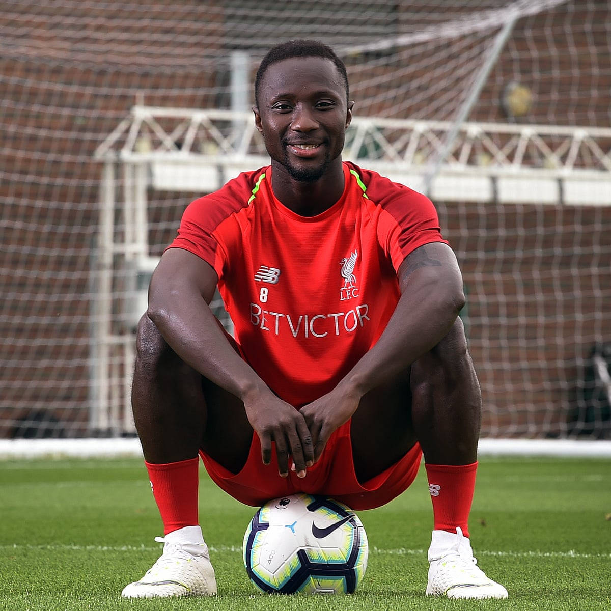 Naby Keita Sitting On Ball Wallpaper