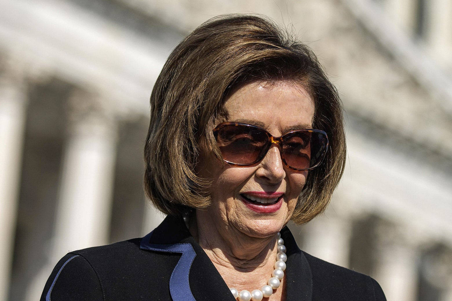 Nancy Pelosi Black Dress Sunglasses Wallpaper