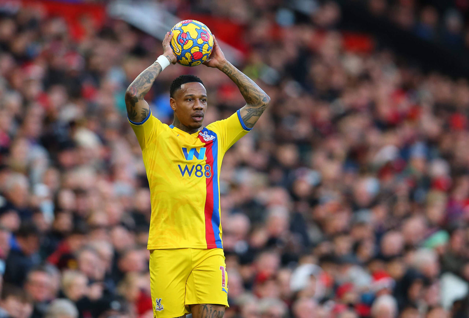 Nathaniel Clyne Holding Ball Over Head Wallpaper