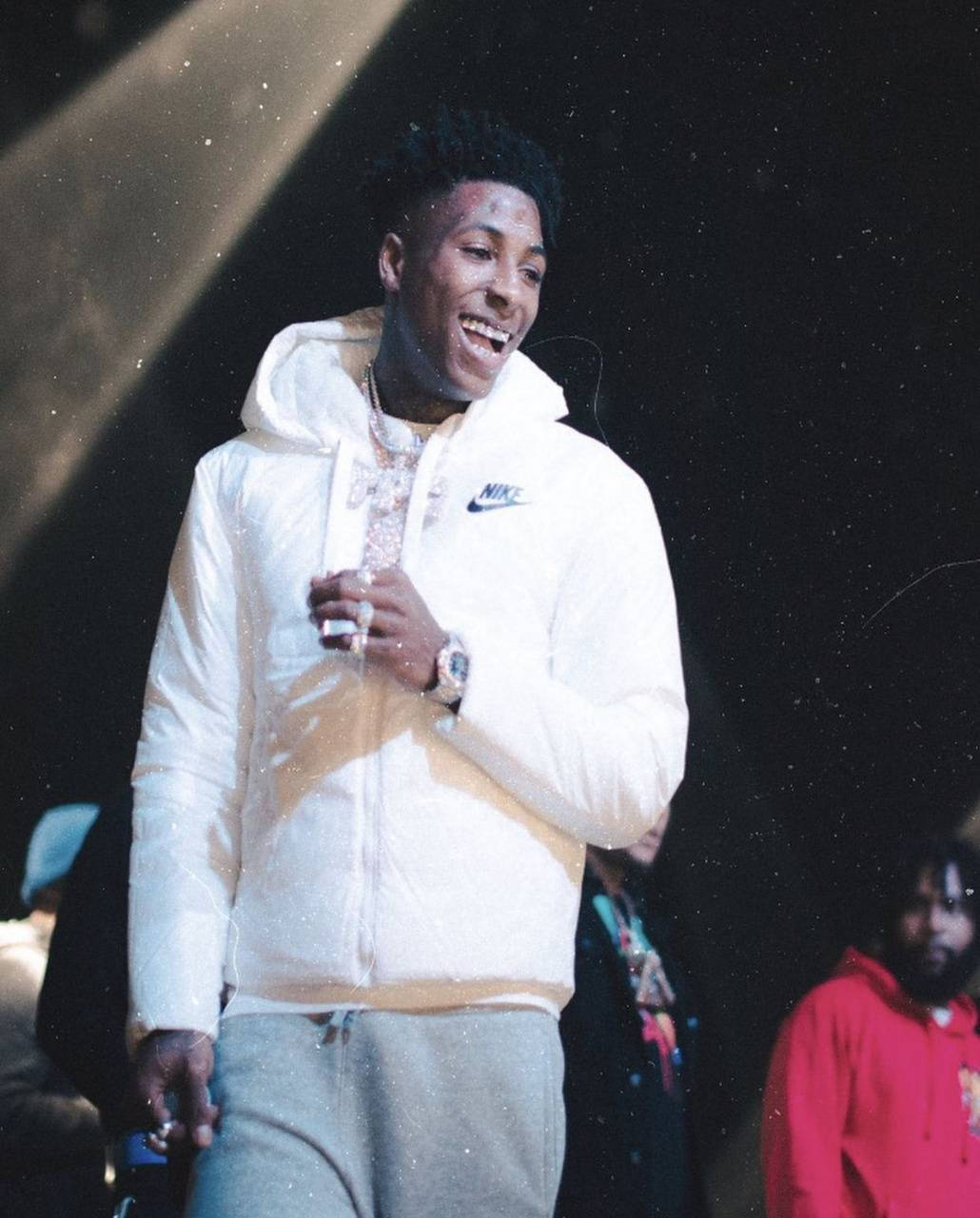 Nba Youngboy Showing Off His White Hoodie Jacket Wallpaper