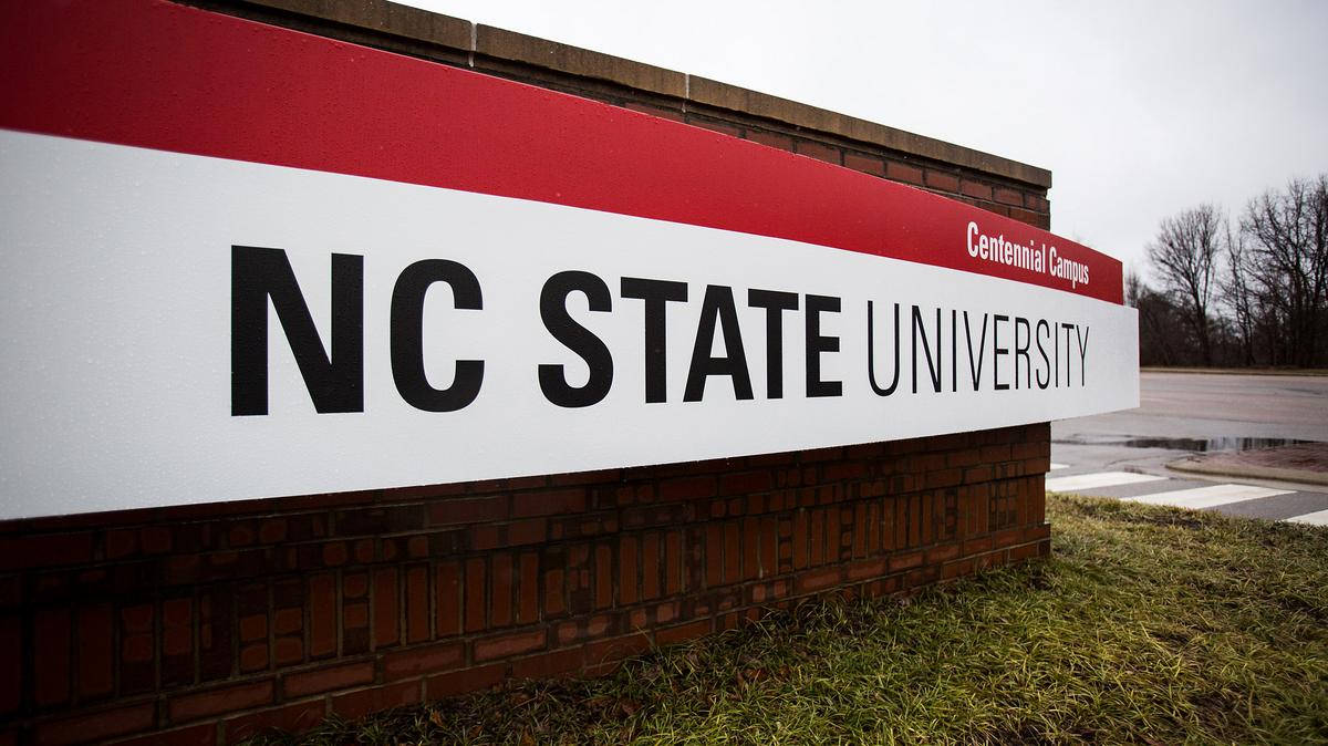 Nc State University's Iconic Red And White Signage Wallpaper