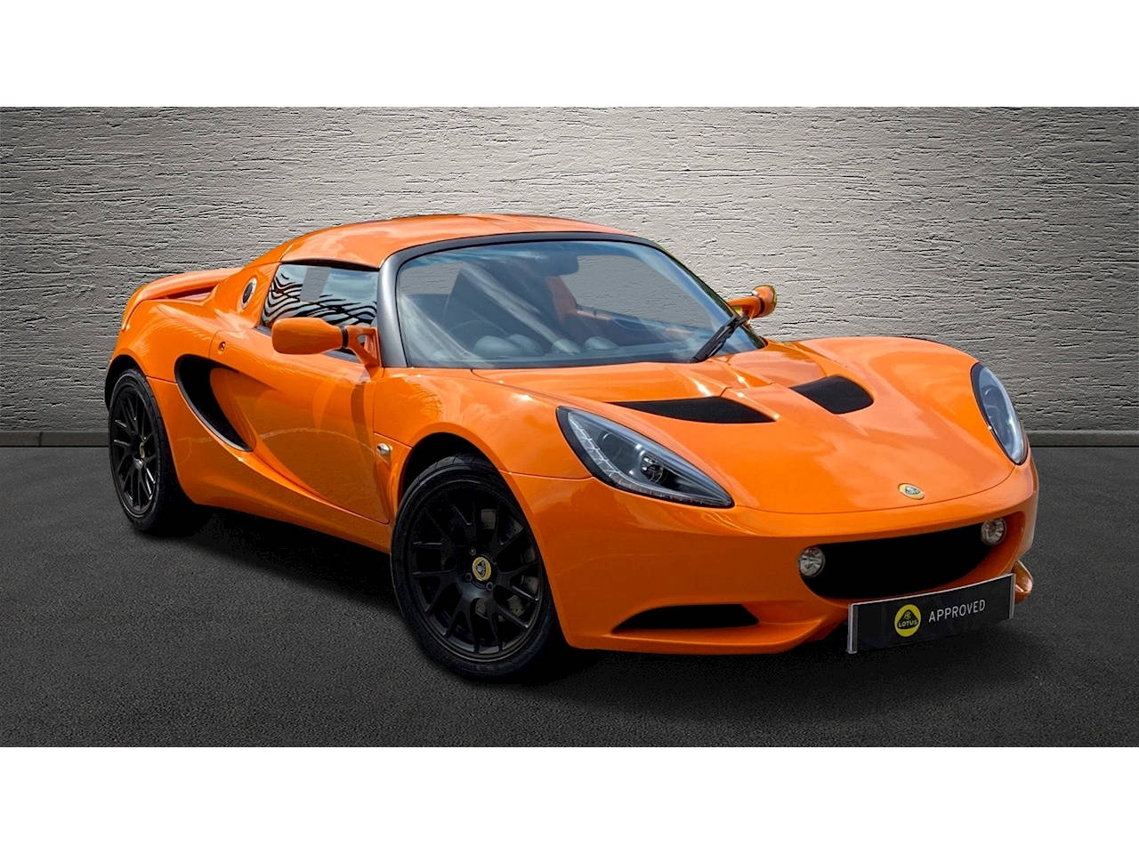 New 2010 Lotus Elise Orange Sports Car Wallpaper