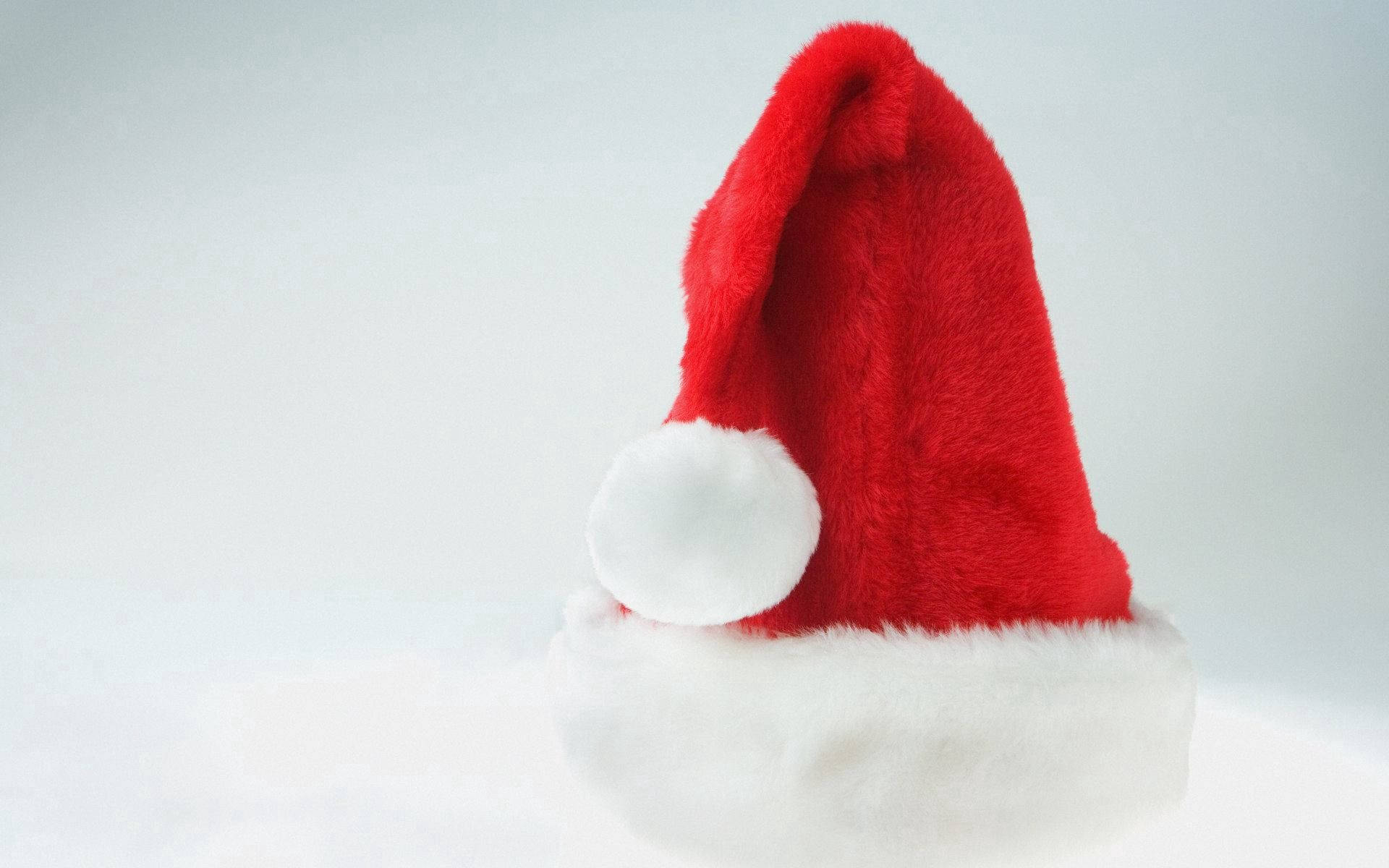New Year's Red Santa Claus Hat Wallpaper