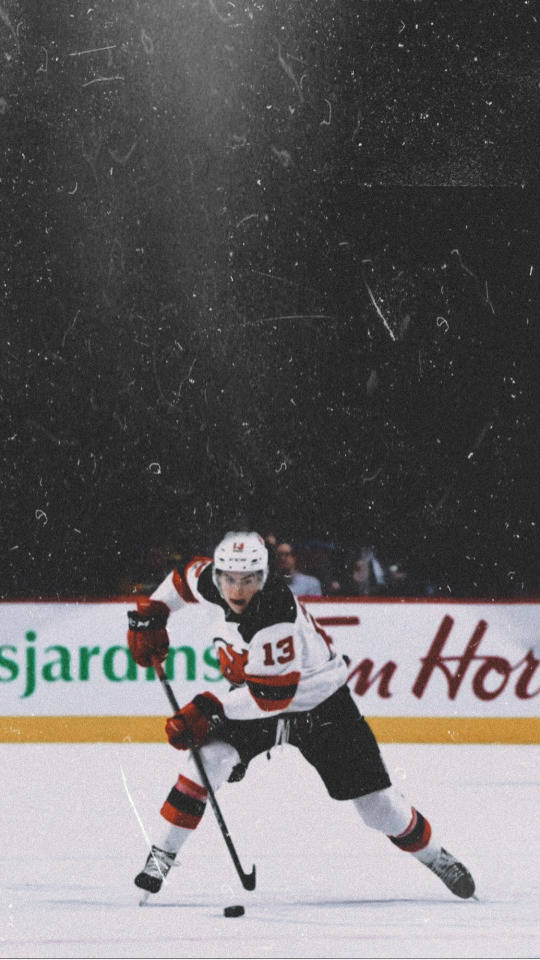 Nico Hischier In Action On The Ice Wallpaper