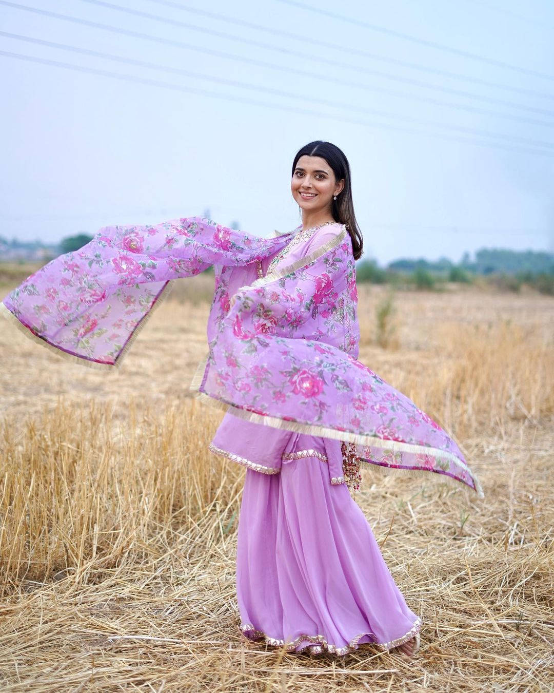 Nimrat Khaira In Field Wallpaper