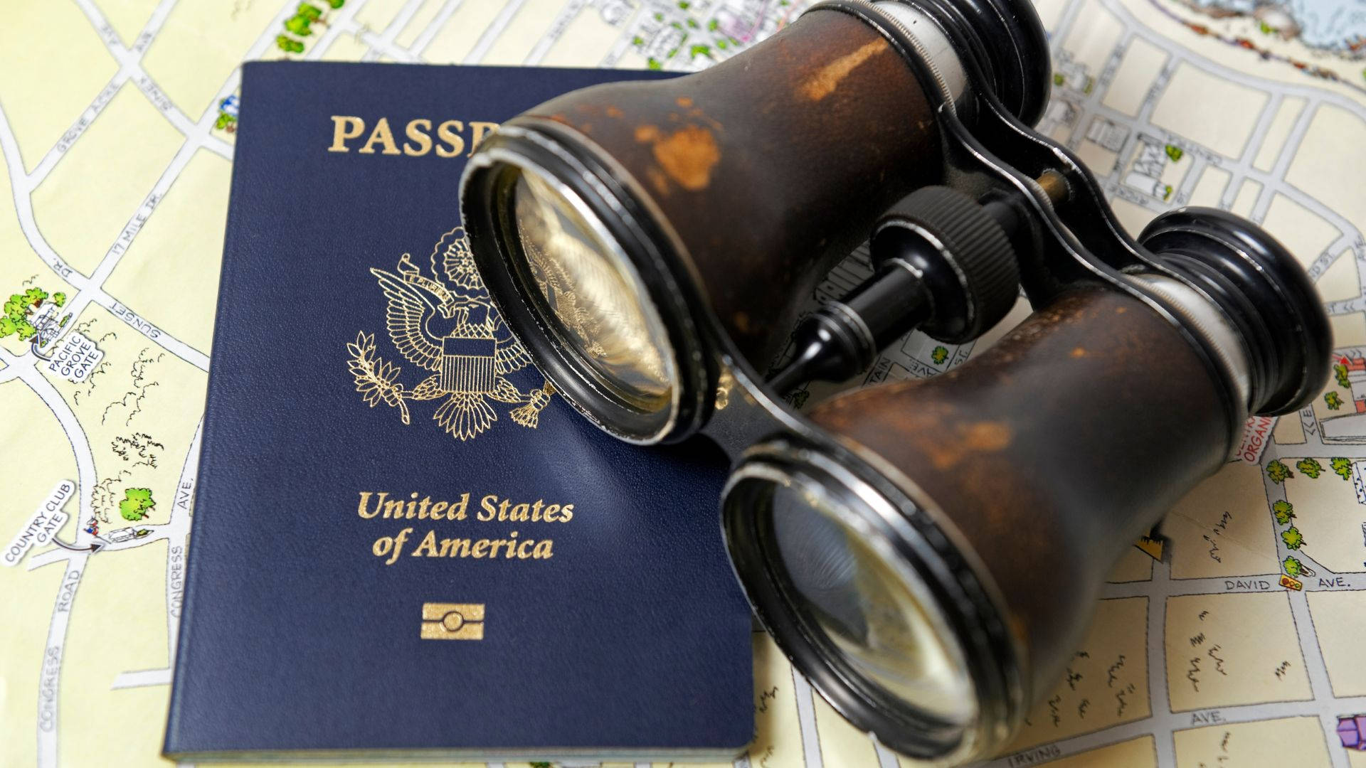 Passport With Old Binoculars Wallpaper