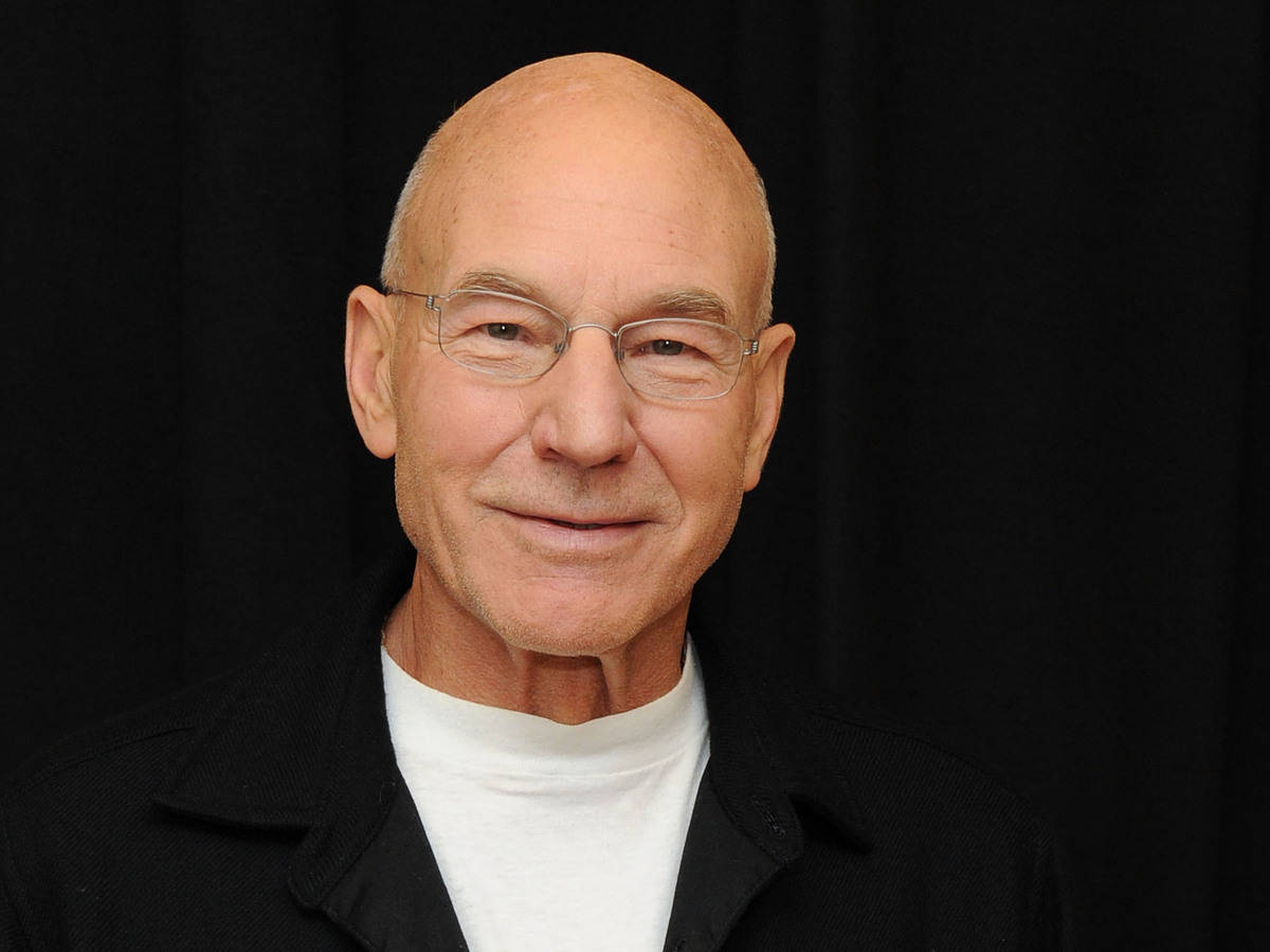 Patrick Stewart On A Black Backdrop Wallpaper