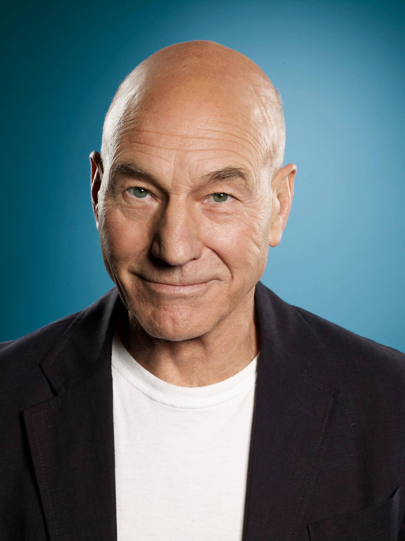 Patrick Stewart On A Blue Background Wallpaper