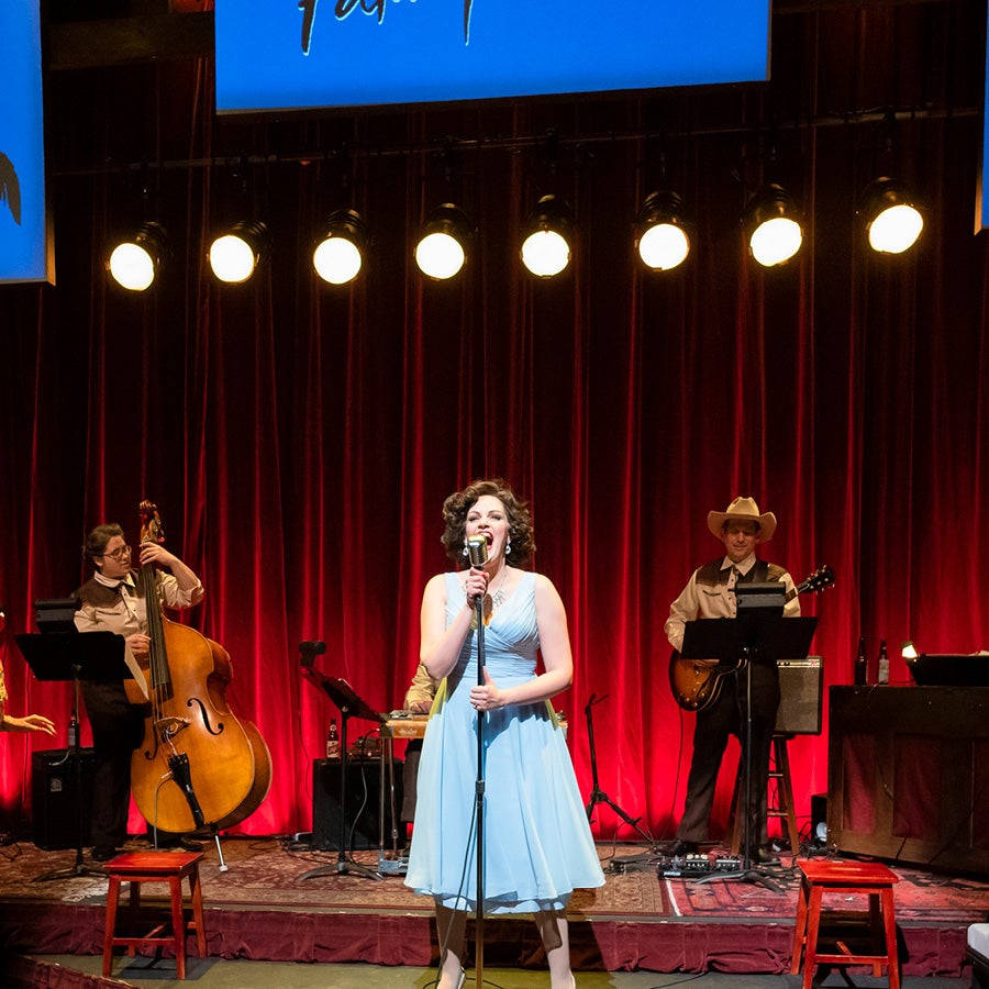 Patsy Cline Singing On Stage Wallpaper