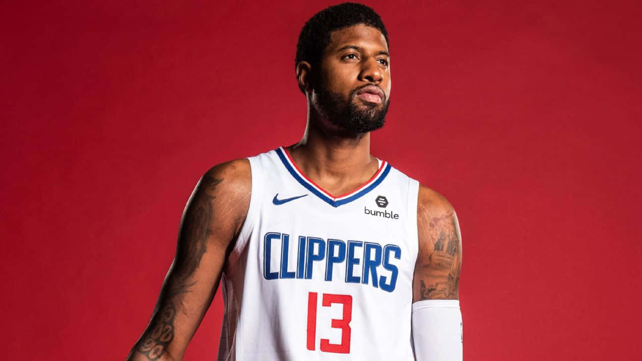 Paul George Taking Flight With The Los Angeles Clippers Wallpaper