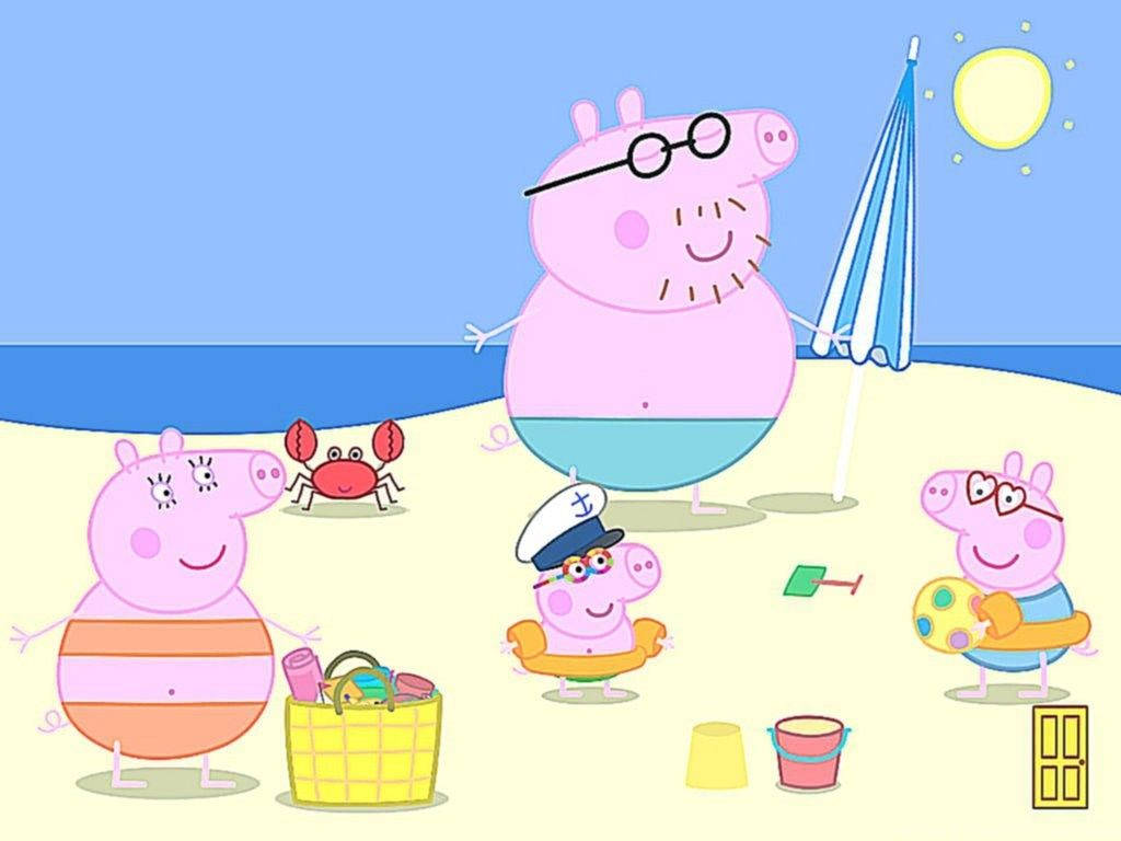 Peppa And Her Family Enjoying A Fun-filled Day At The Beach Wallpaper