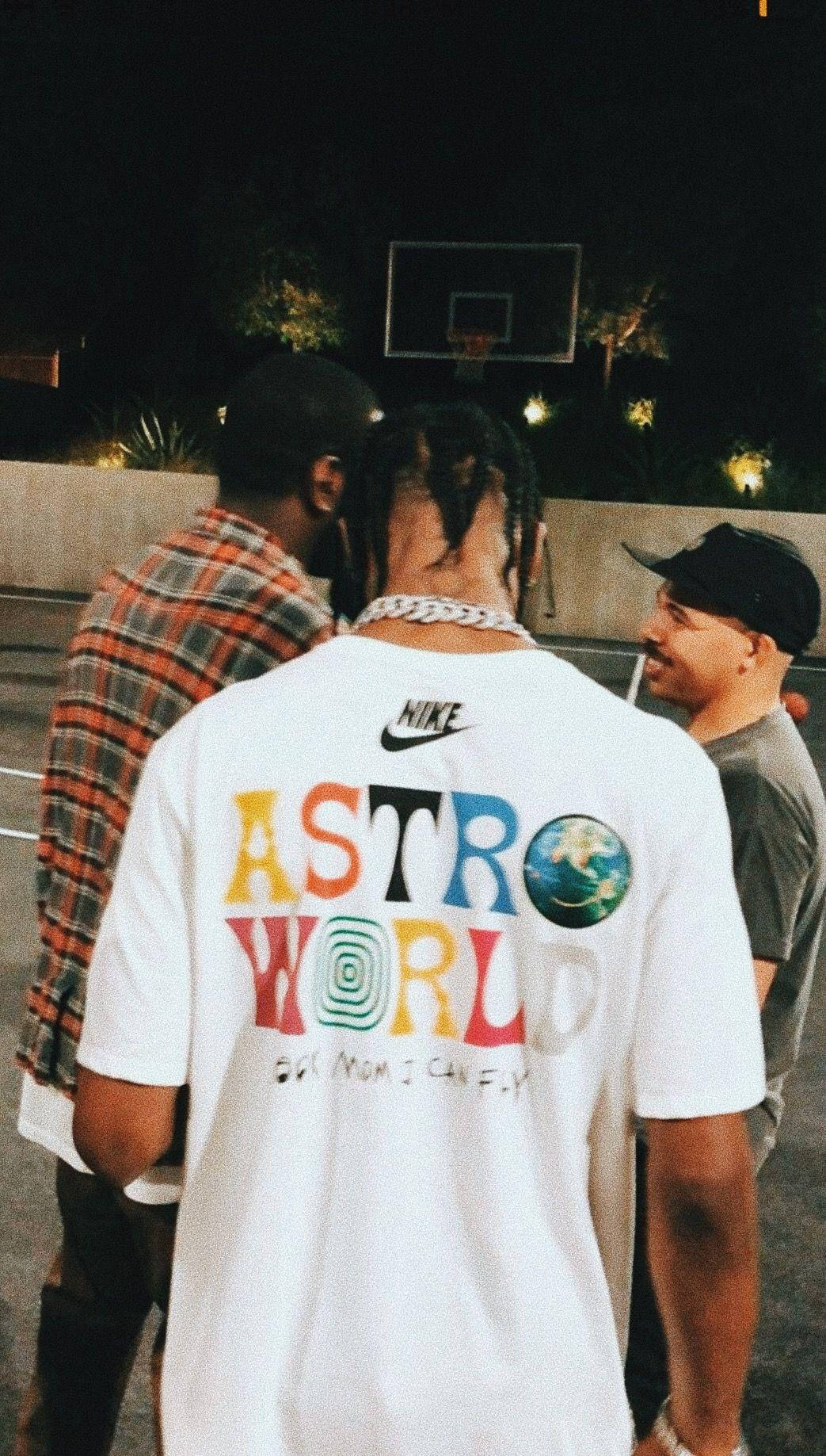 Person Wearing Travis Scott Astroworld T-shirt Wallpaper