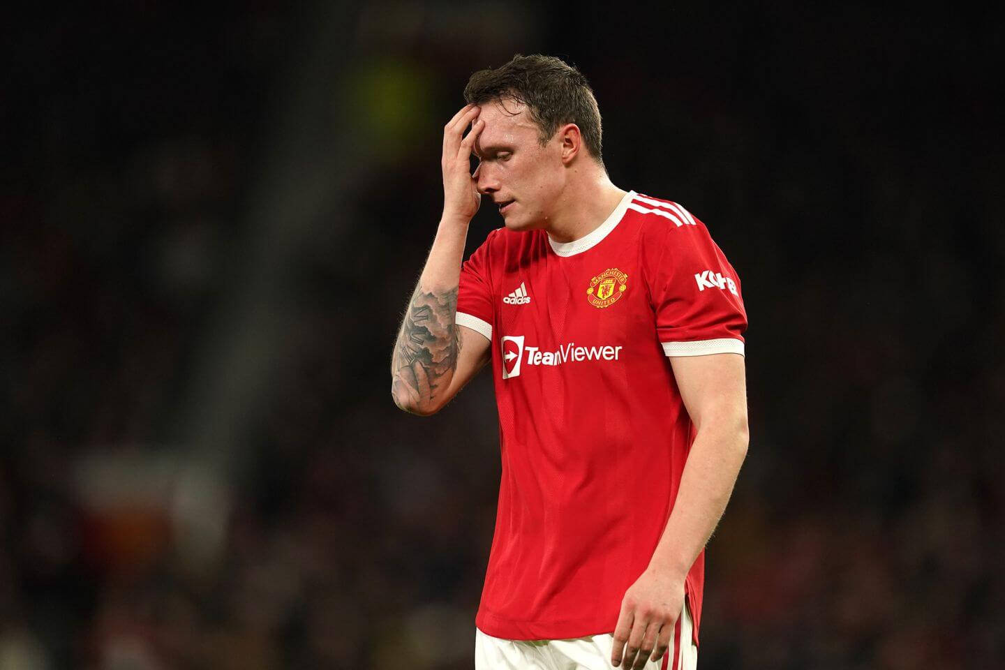 Phil Jones Facepalming During A Football Match. Wallpaper