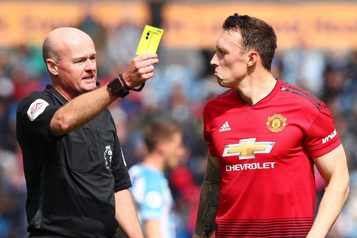 Phil Jones Getting Yellow Card Wallpaper