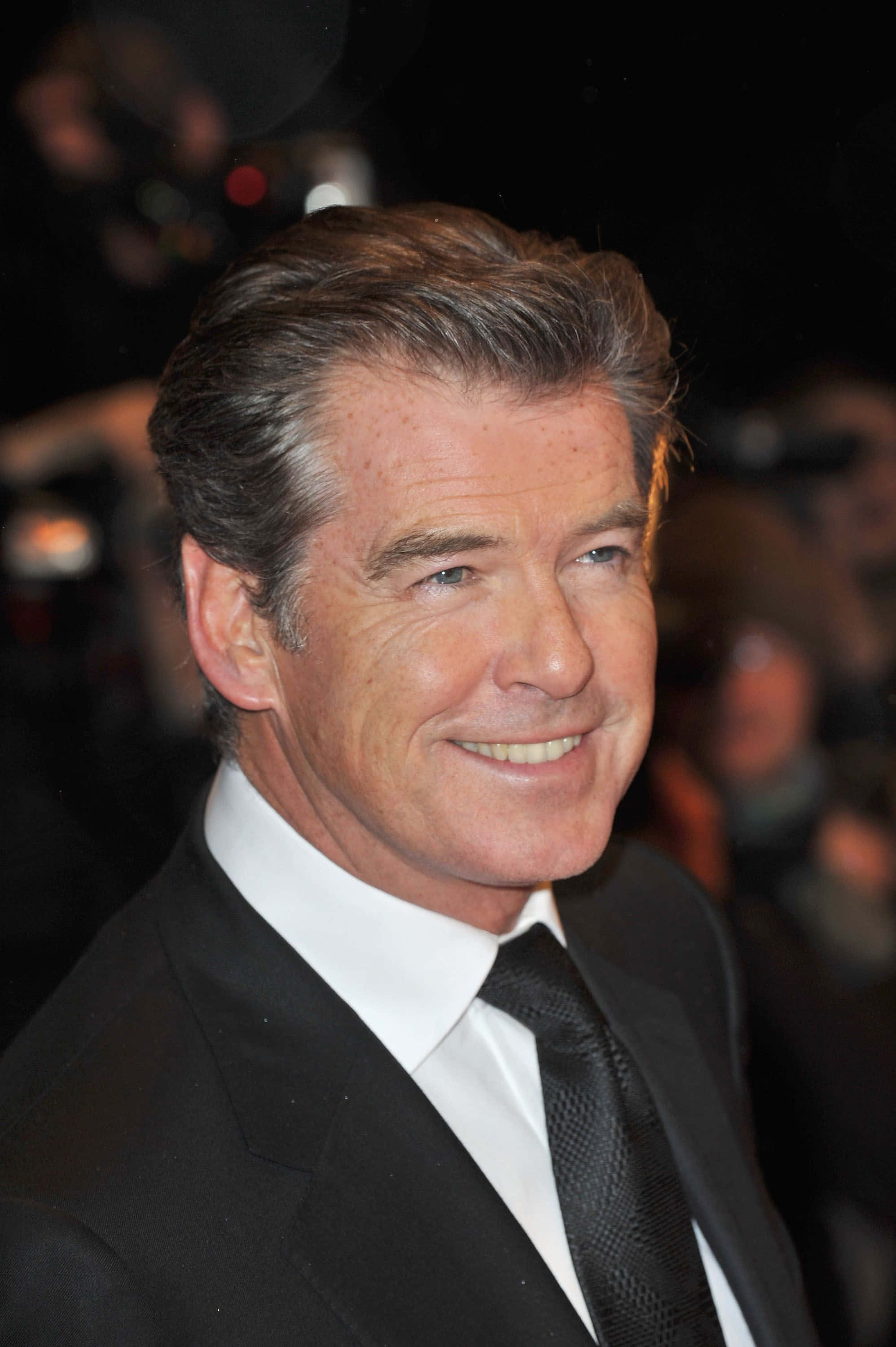 Pierce Brosnan Looking Dashing In 1996 Wallpaper