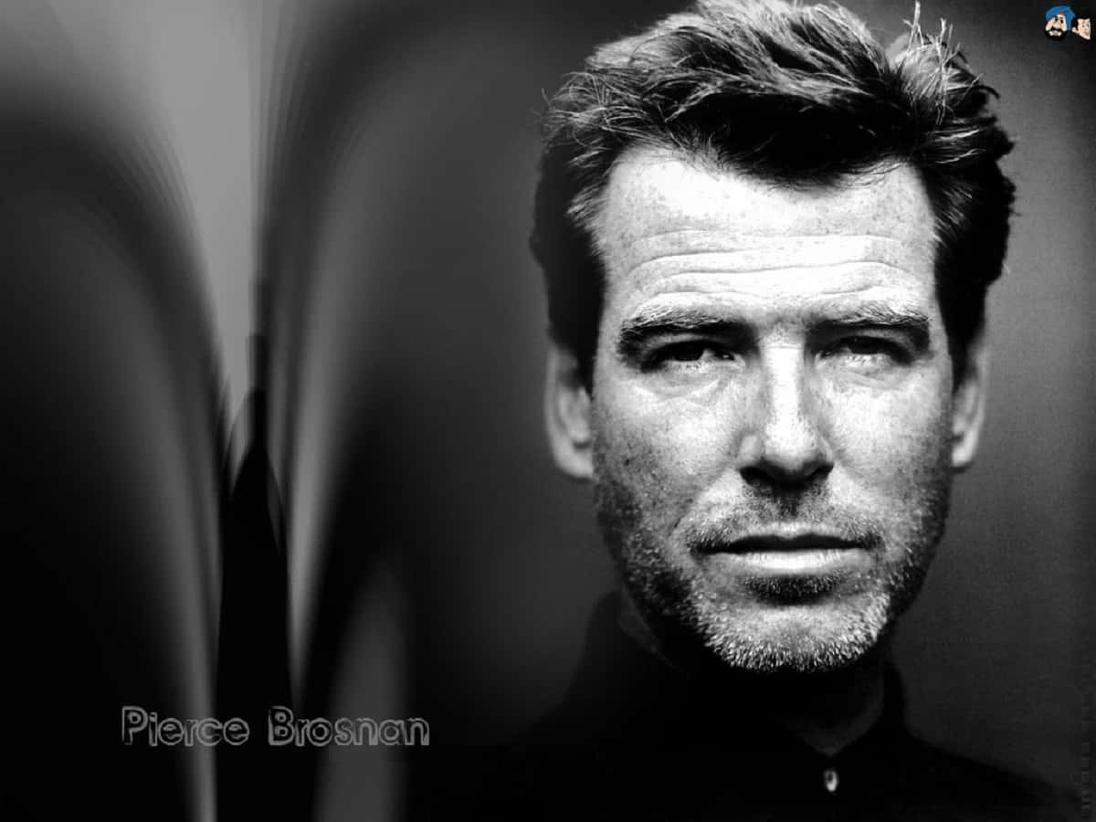 Pierce Brosnan Looking Suave In A Black Tuxedo. Wallpaper