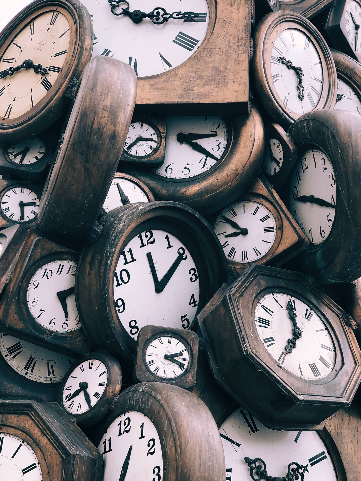 Pile Of Wooden Clocks Wallpaper WallpapersOK