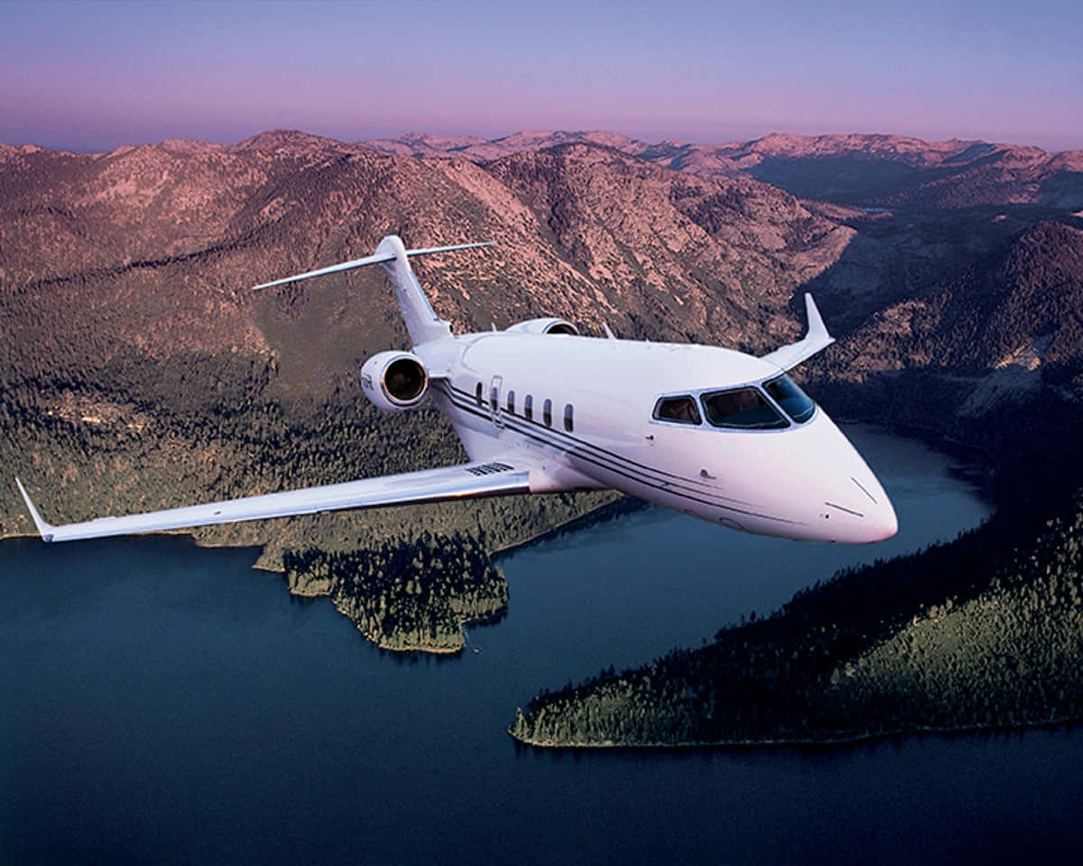 Private Jet Over Landscape Wallpaper