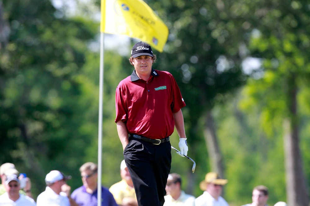 Pro Golfer Jason Dufner In A Bright Red Shirt Wallpaper