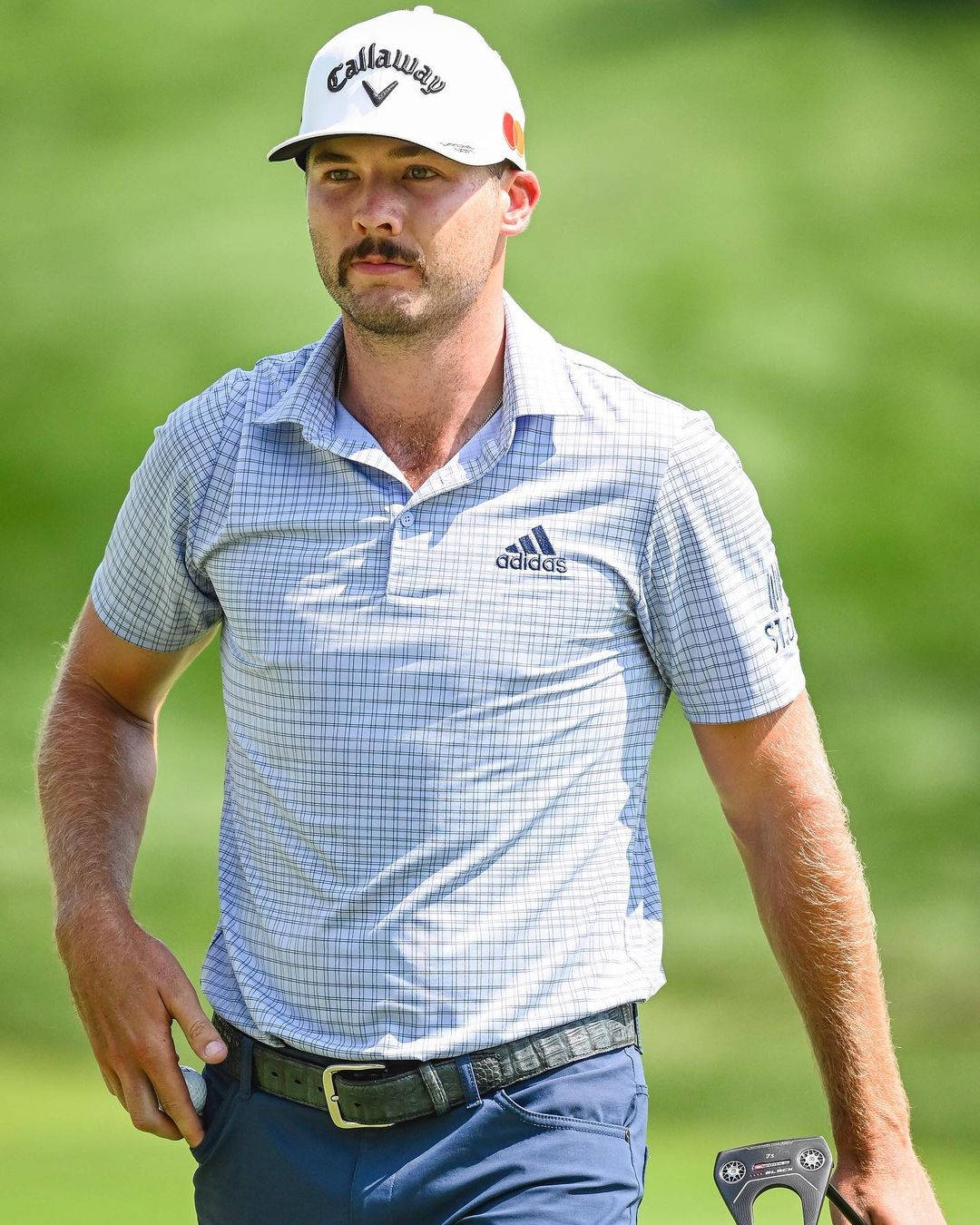 Professional Golfer Sam Burns Sporting A Moustache Wallpaper