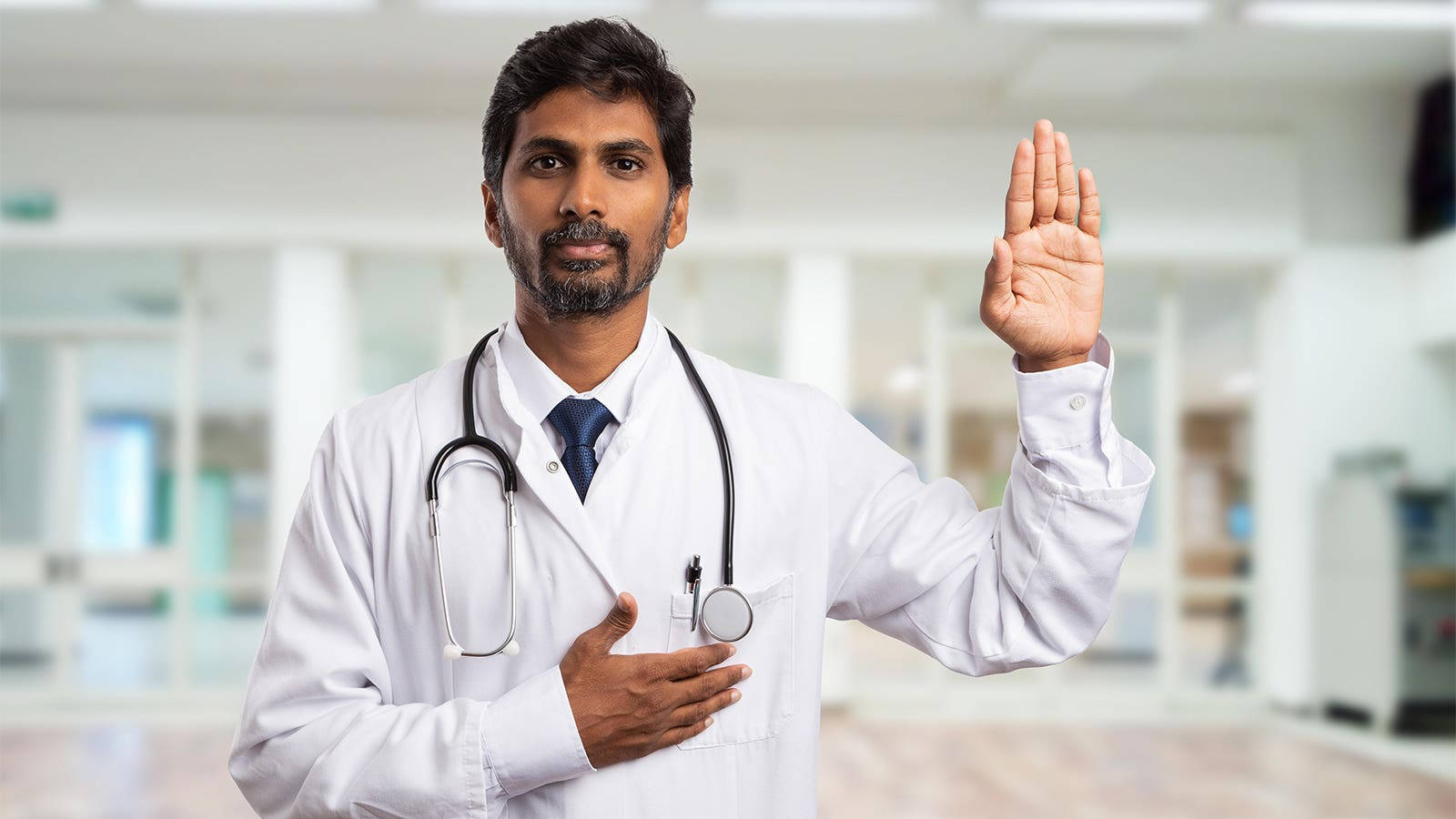 Professional Physician In White Coat Wallpaper