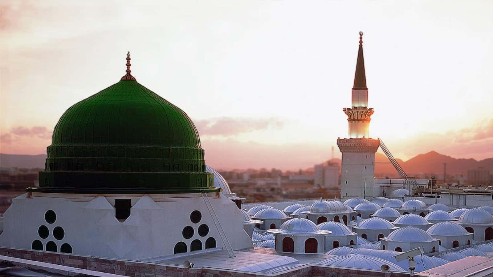 Prophet's Mosque At Sunset In Madina Wallpaper