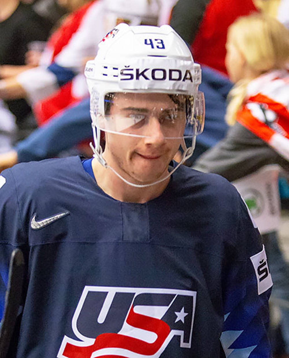 Quinn Hughes Wearing Skoda Helment And Biting Lips Wallpaper