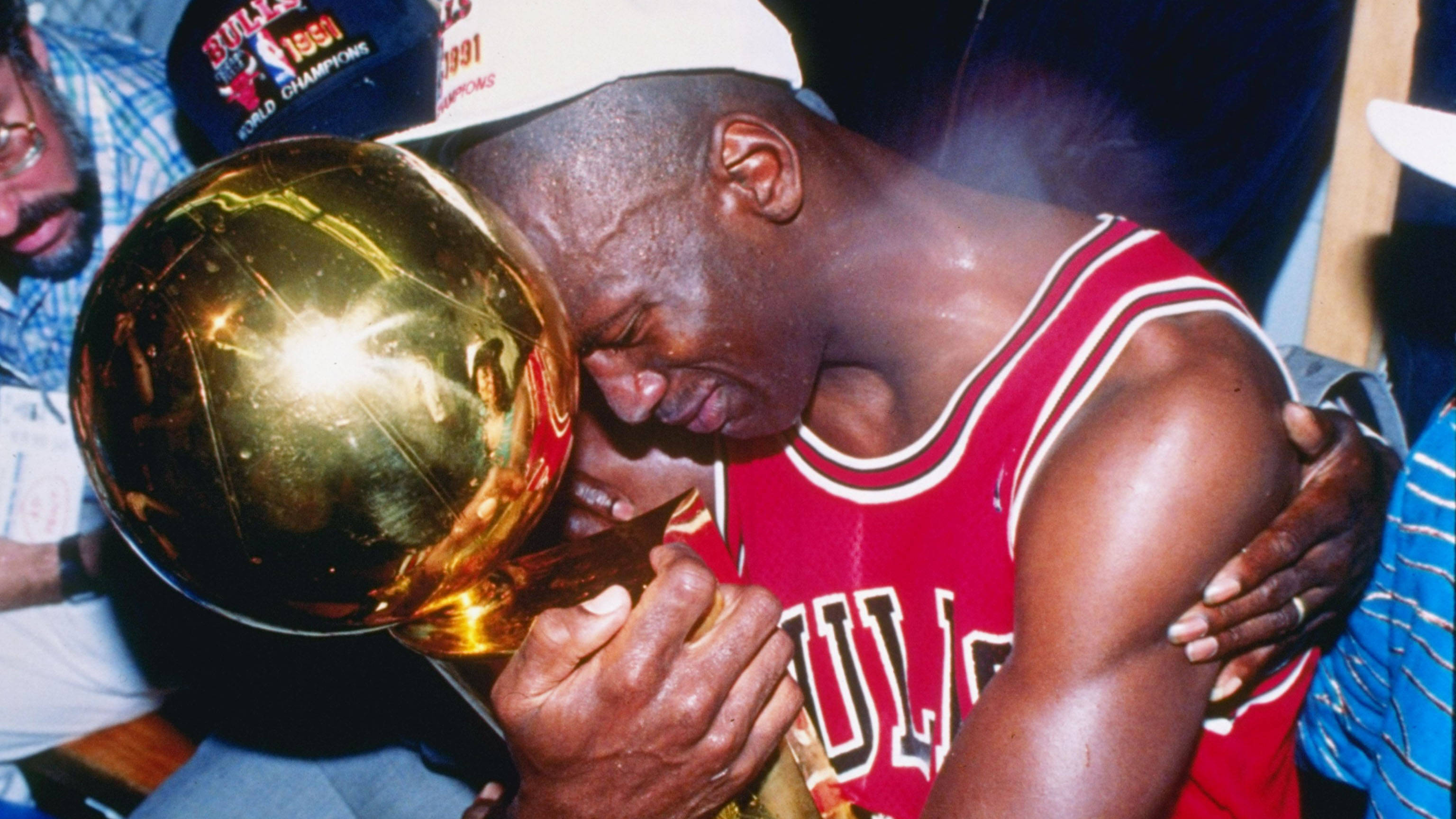 Rare Cool Emotional Jordan Holding A Trophy Wallpaper