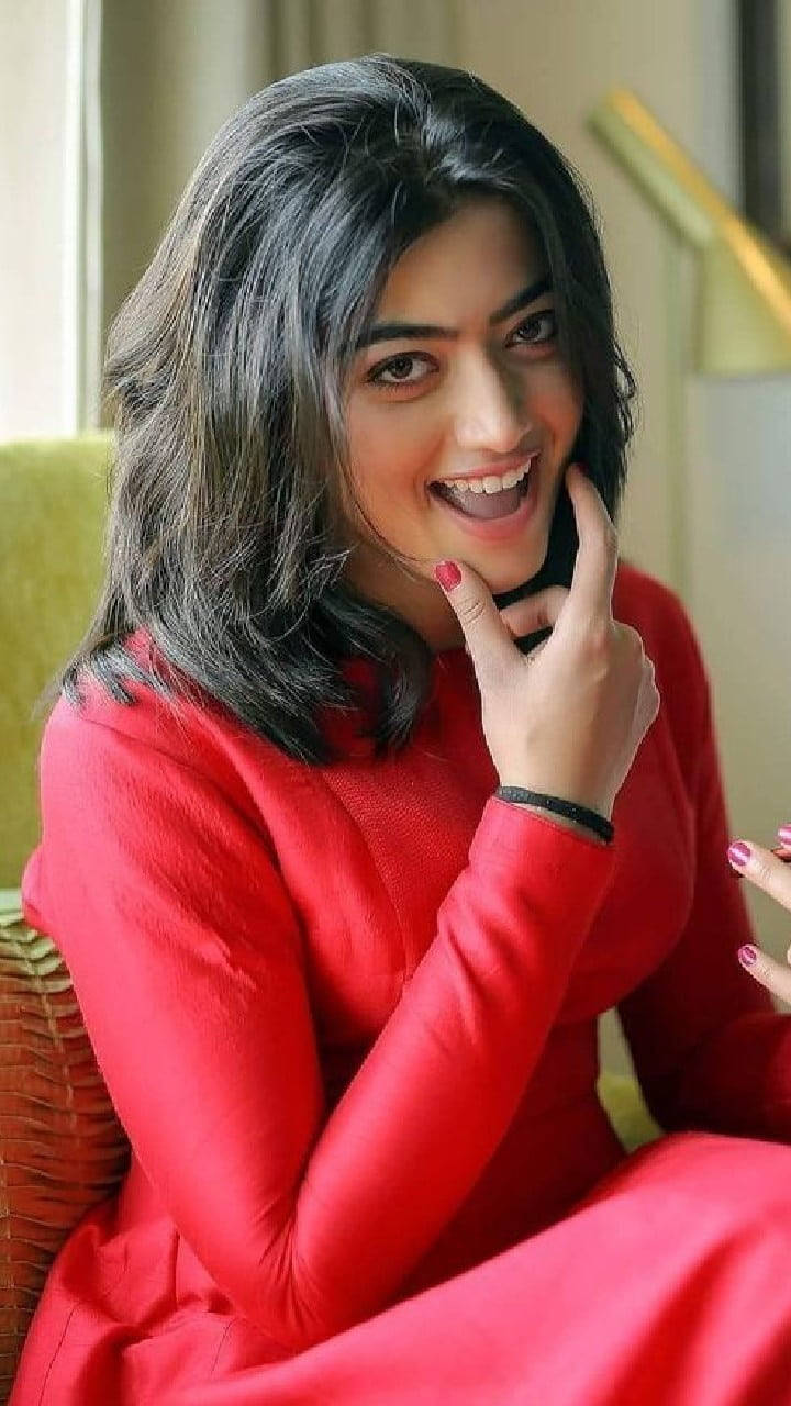 Rashmika Mandanna Hd Neon Pink Dress Wallpaper