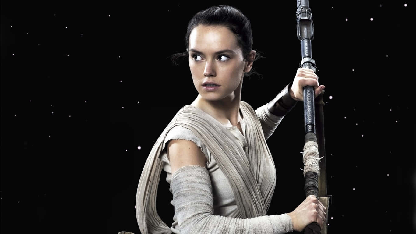 Rey Battles Kylo Ren In An Intense Showdown In Star Wars. Wallpaper