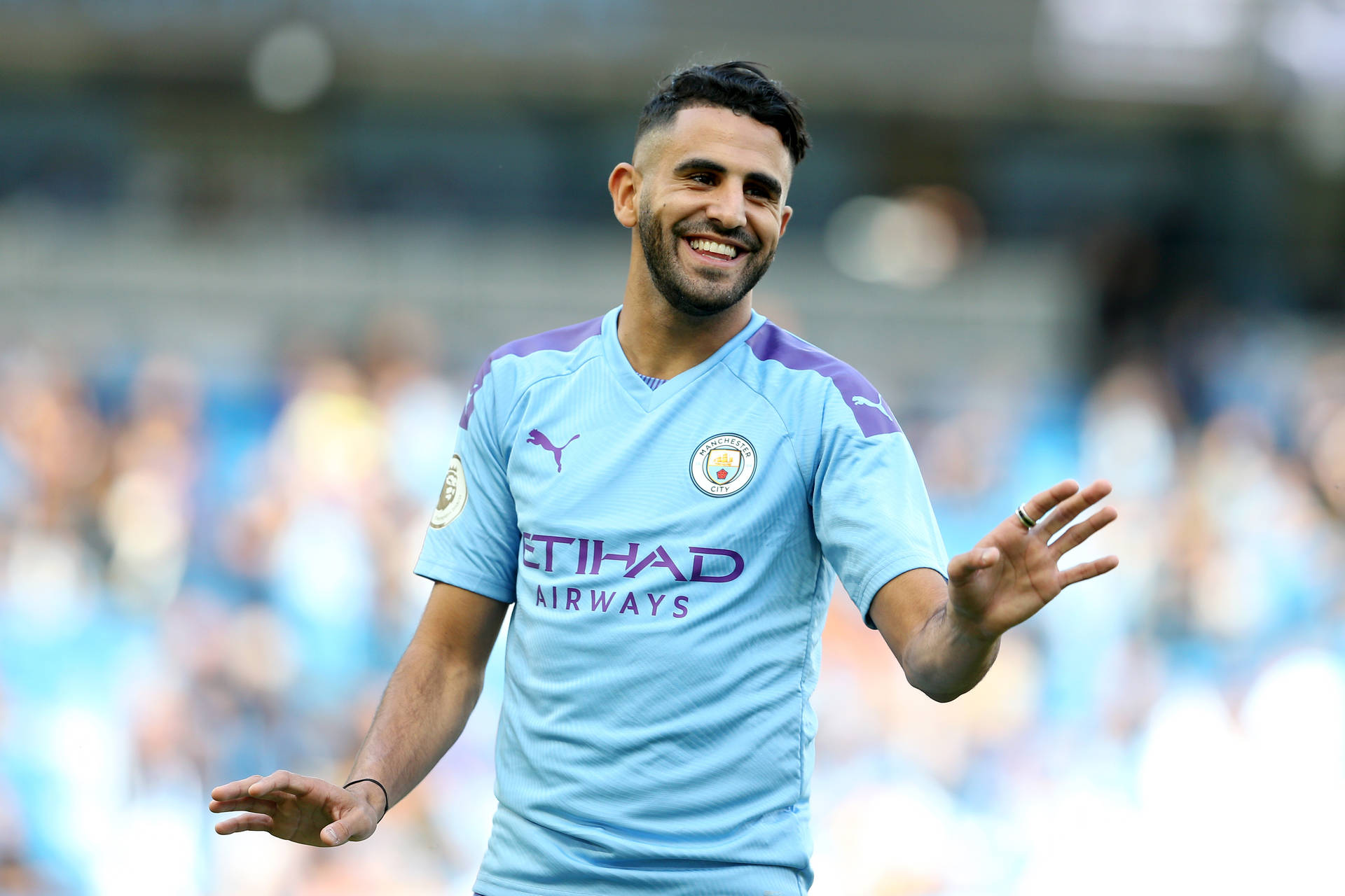 Riyad Mahrez Smiling Waving Wallpaper