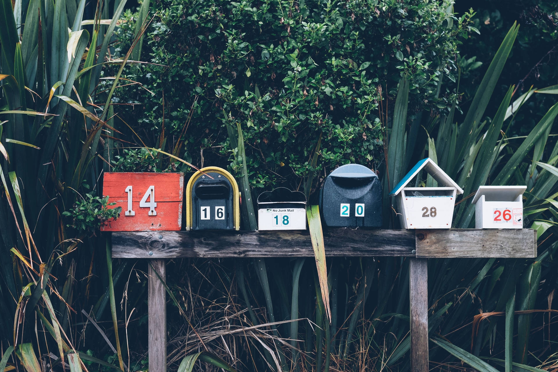 Roadside Makeshift Mailboxes In A Row Wallpaper