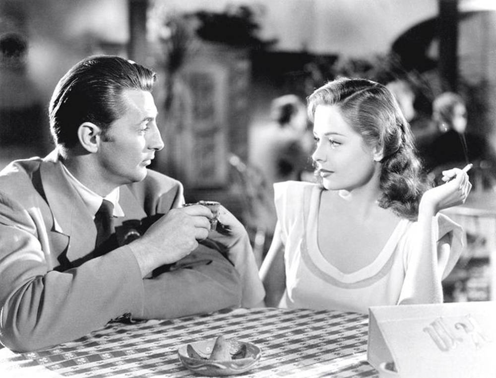 Robert Mitchum And Jane Greer At Table Wallpaper