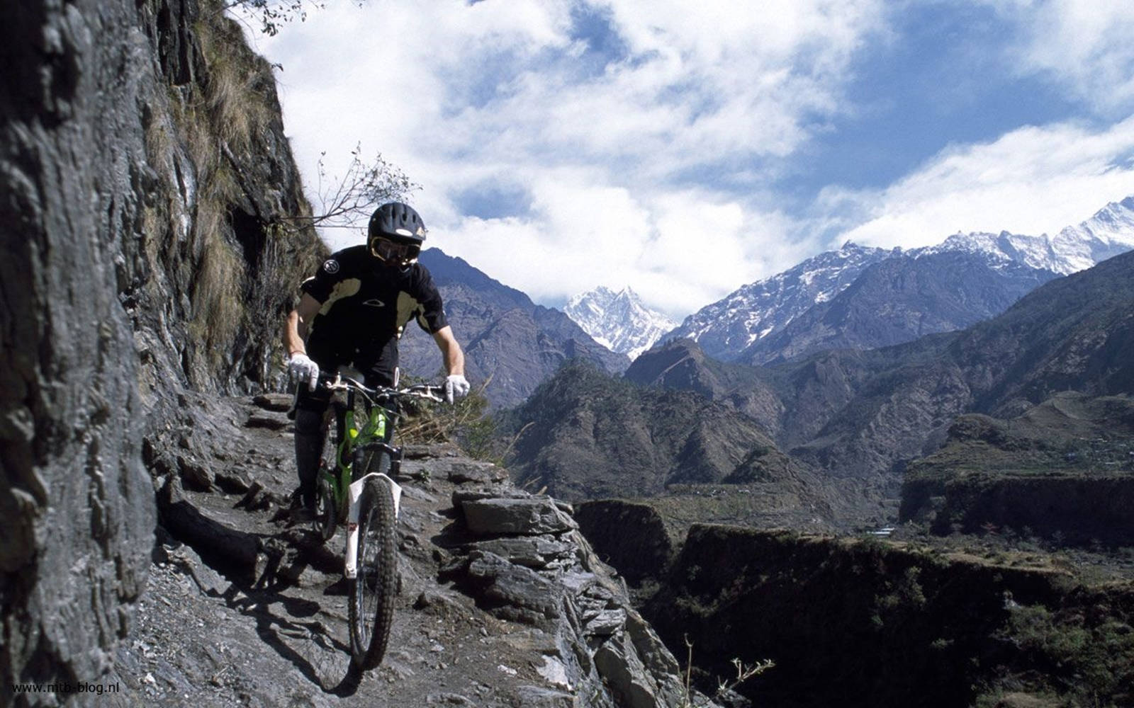 Rock Mountain Cliff Mtb Ride Wallpaper