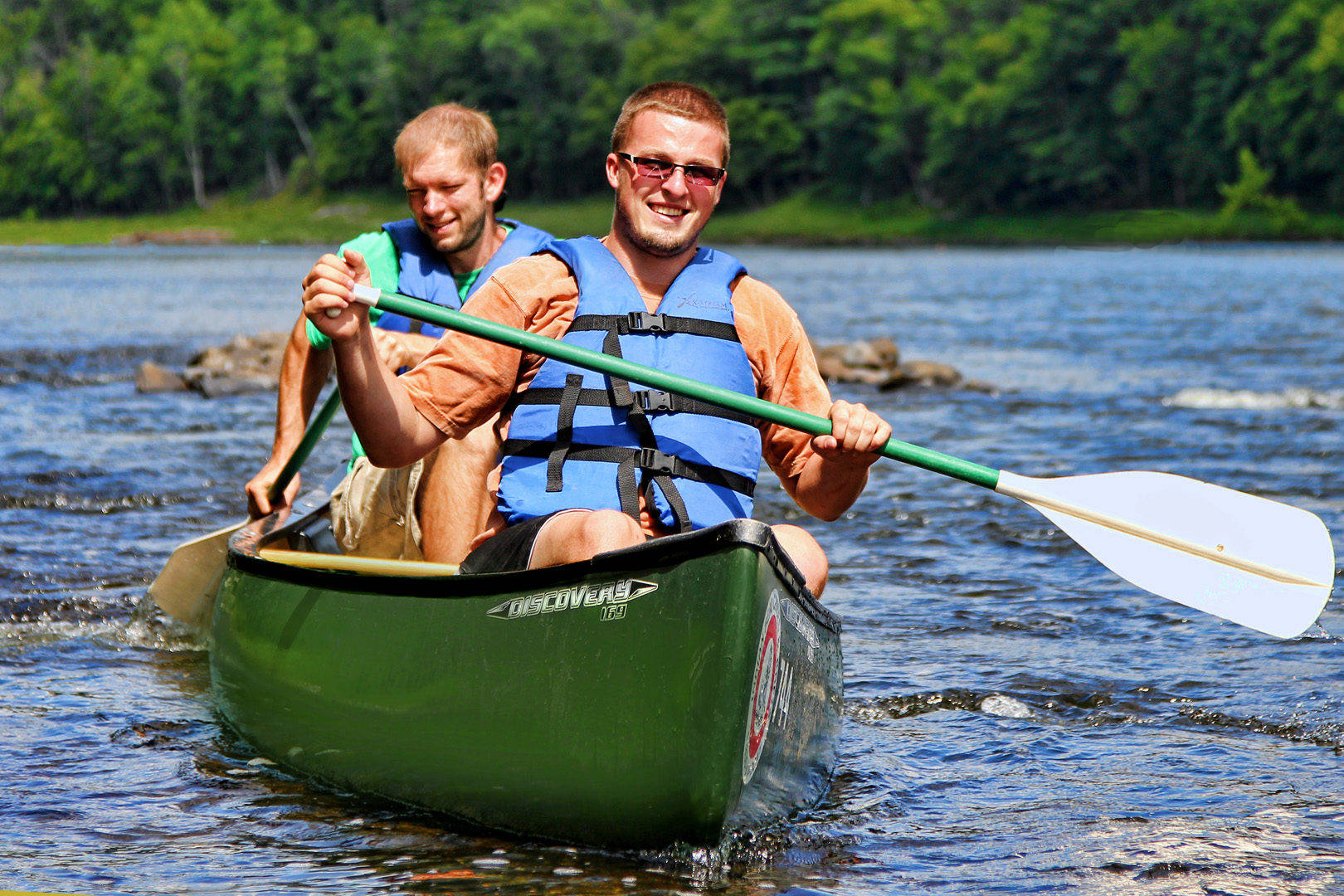 Rowing At Different Side Canoeing Wallpaper