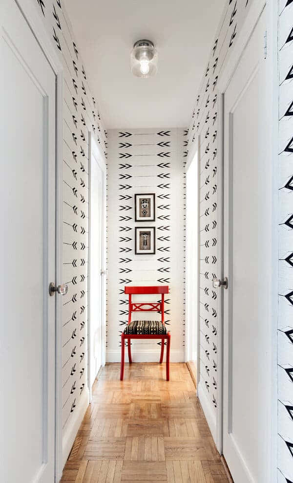 Rustic Wooden Chair In A Cozy Hallway Wallpaper