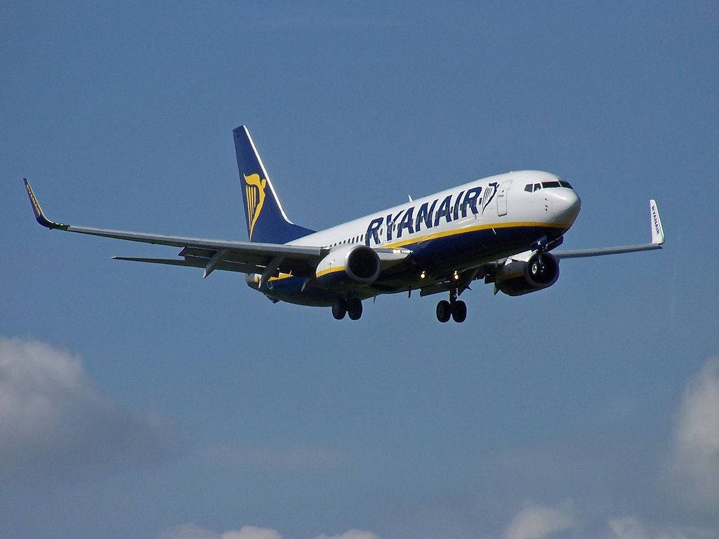 Ryanair Flying In Dark Blue Sky Wallpaper