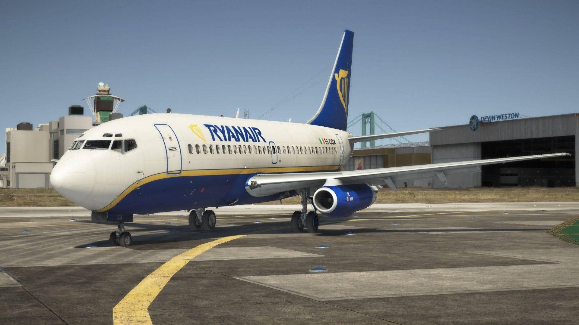 Ryanair Plane With Buildings Behind Wallpaper