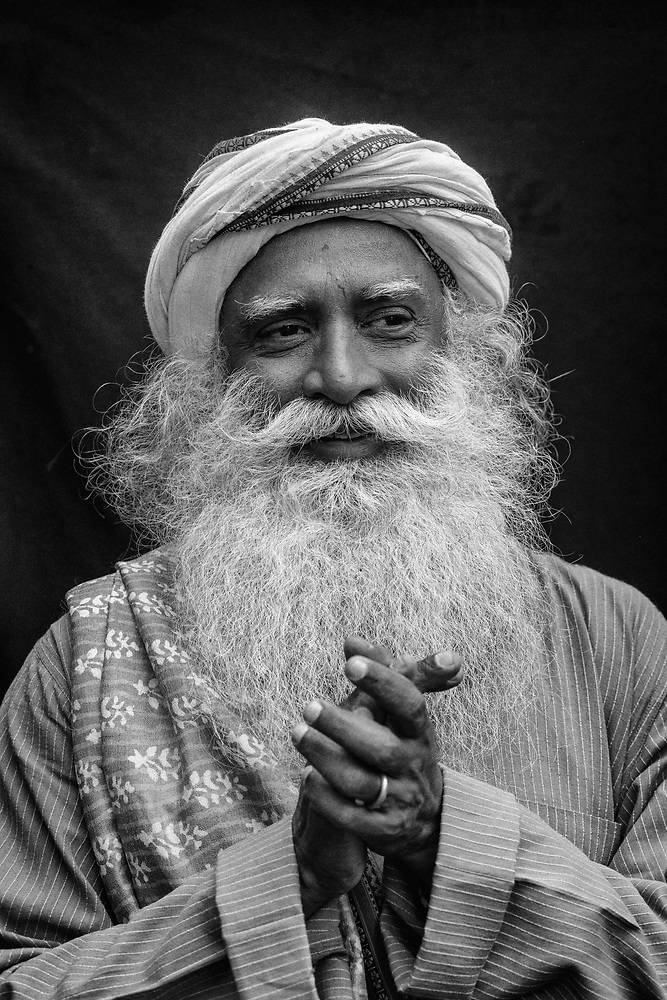 Sadhguru Intertwining His Fingers Wallpaper