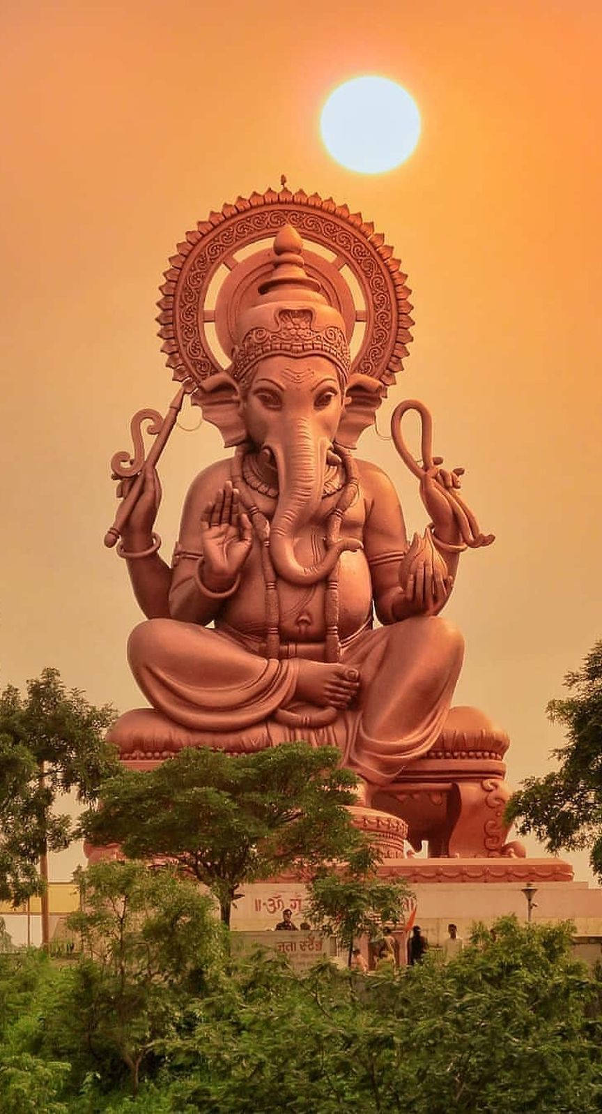 Scenic Ganesh Mobile Against A Setting Sun Wallpaper