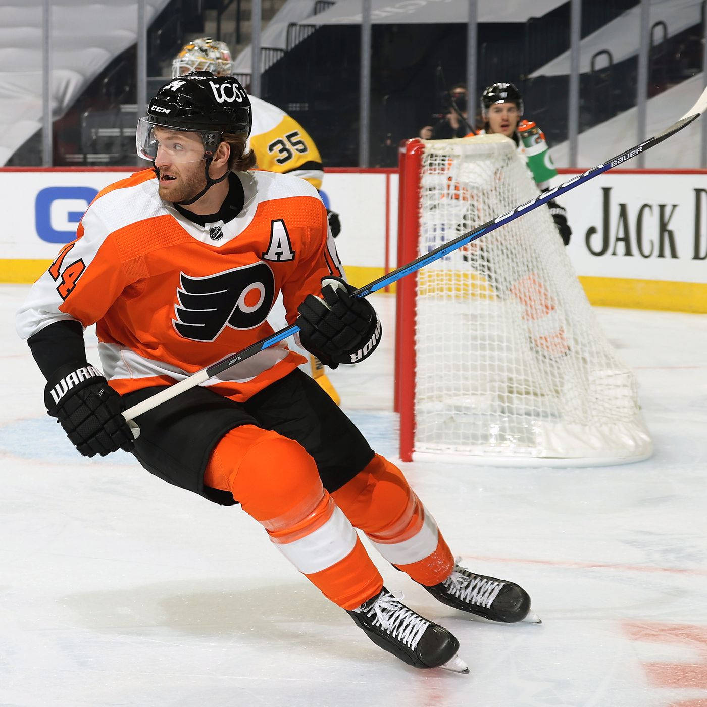 Sean Couturier Gliding On Ice Rink Wallpaper