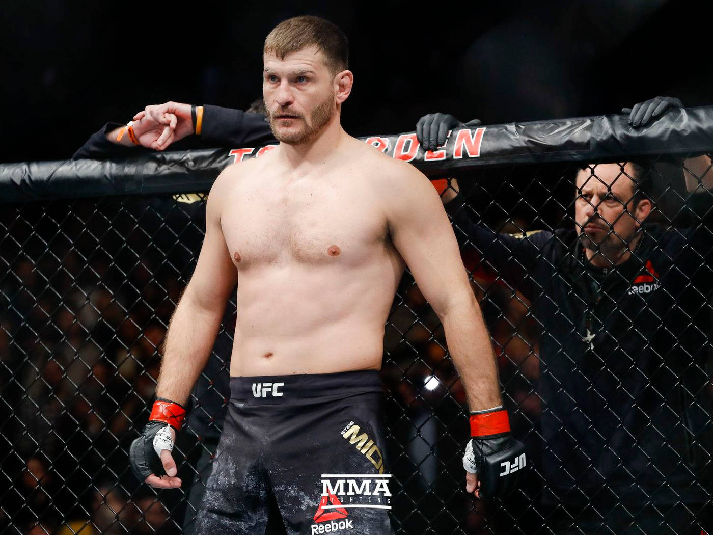 Serious Stipe Miocic On Octagon Wallpaper