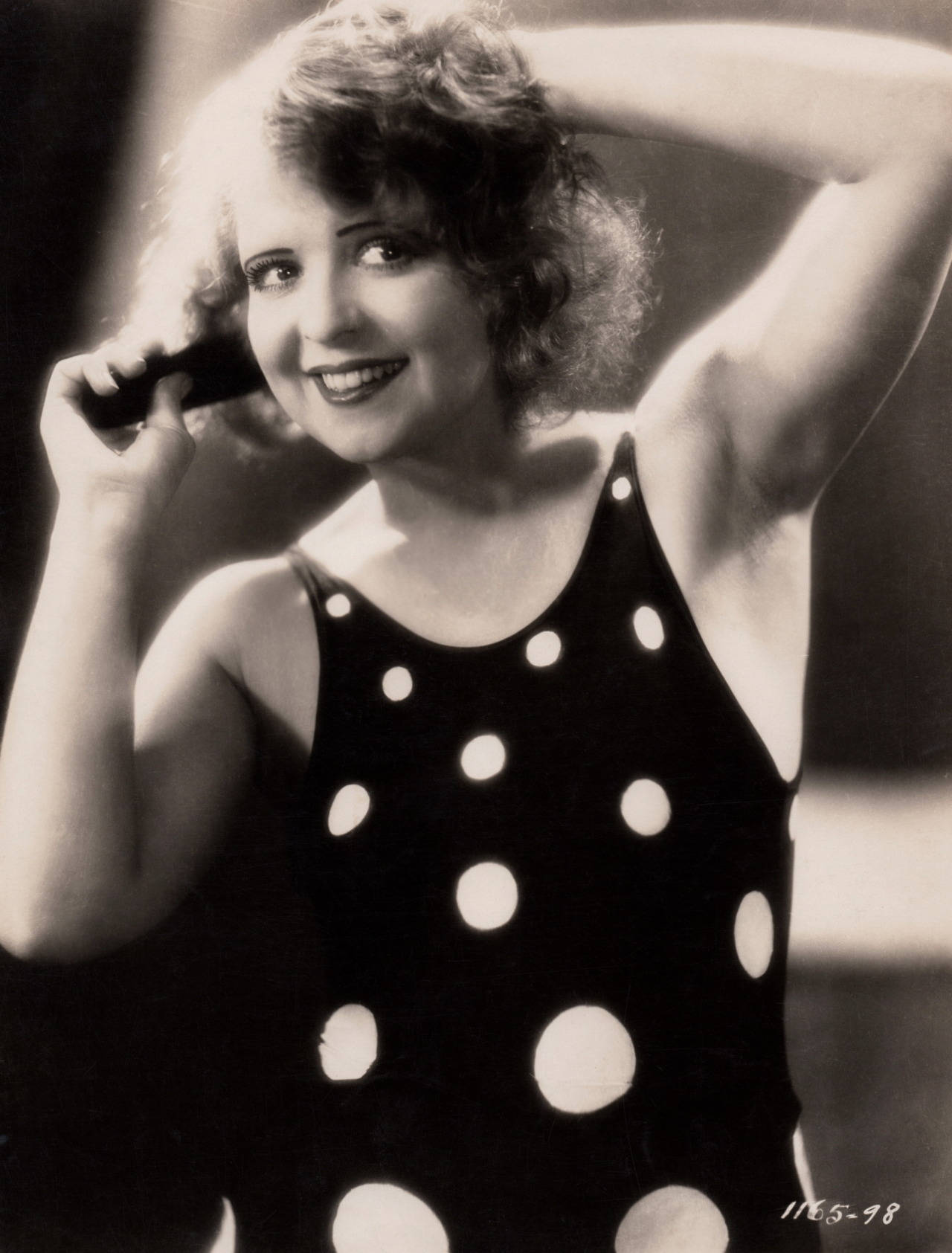 Silent Film Diva Clara Bow In A Polka Dot Dress Wallpaper