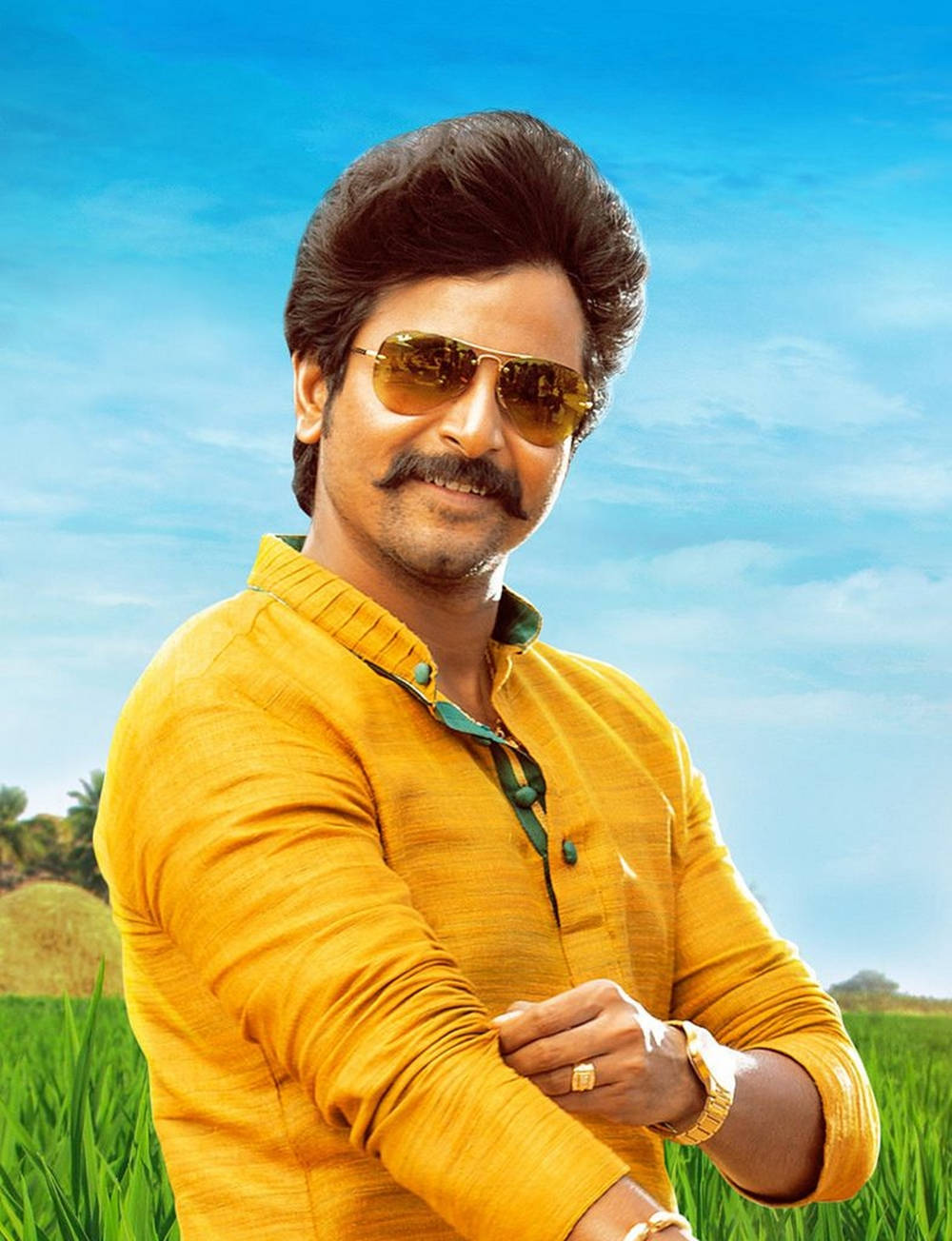 Sivakarthikeyan In Yellow Shirt With Grass Wallpaper