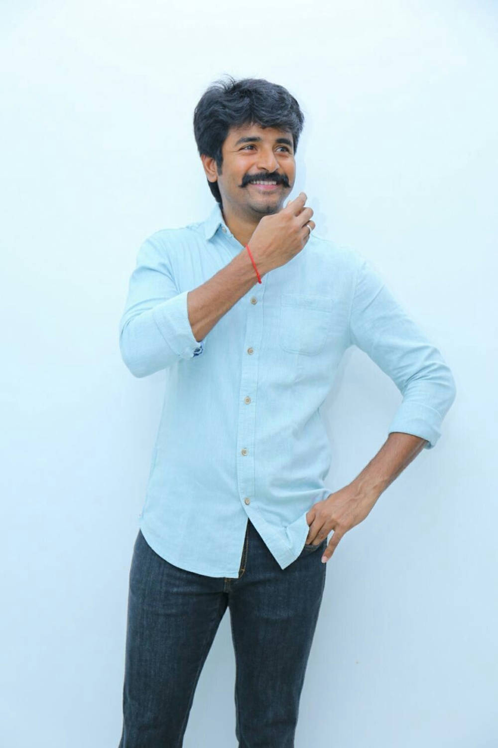 Sivakarthikeyan Posing In A Light-blue Shirt Wallpaper