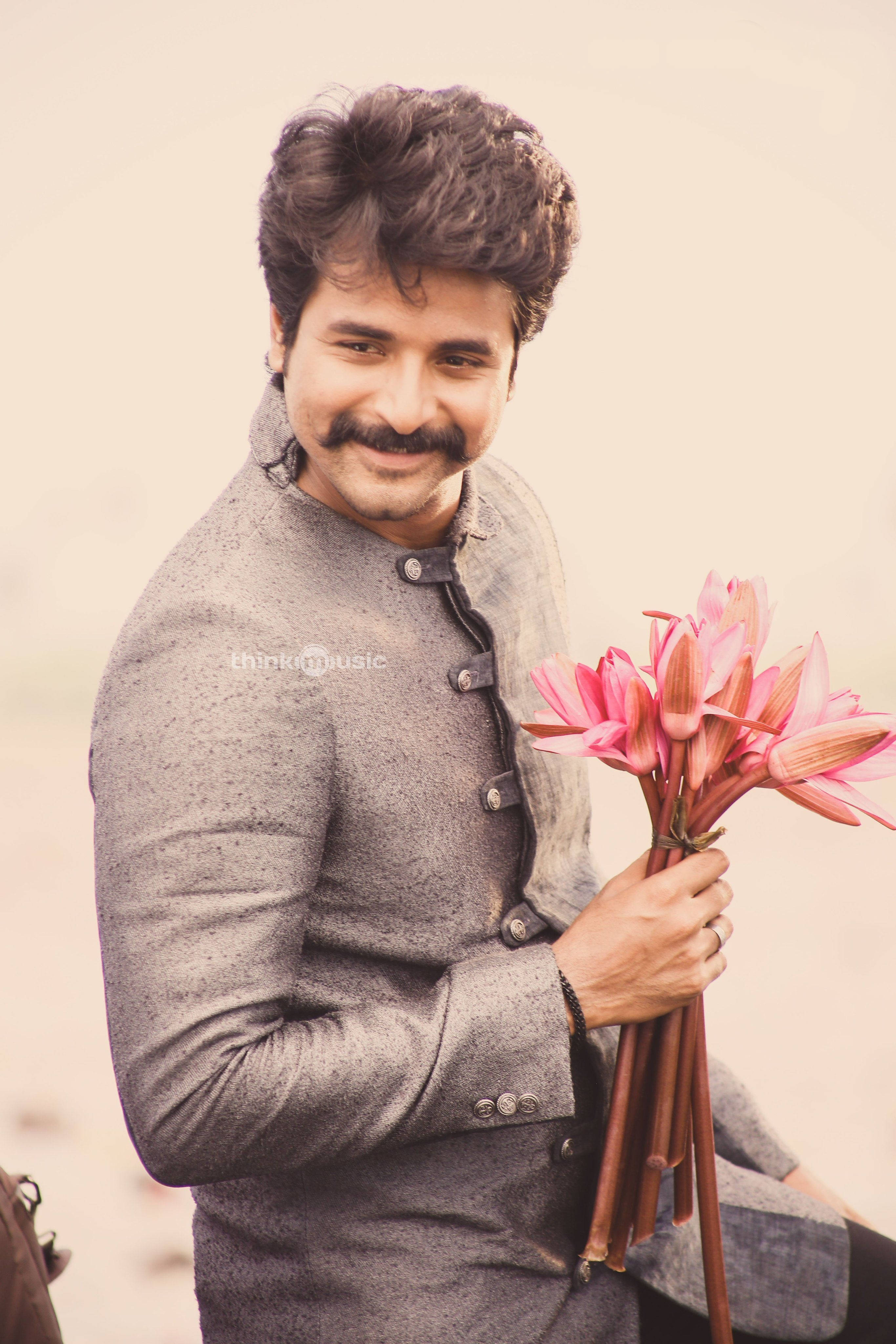 Sivakarthikeyan With Pink Flowers Wallpaper